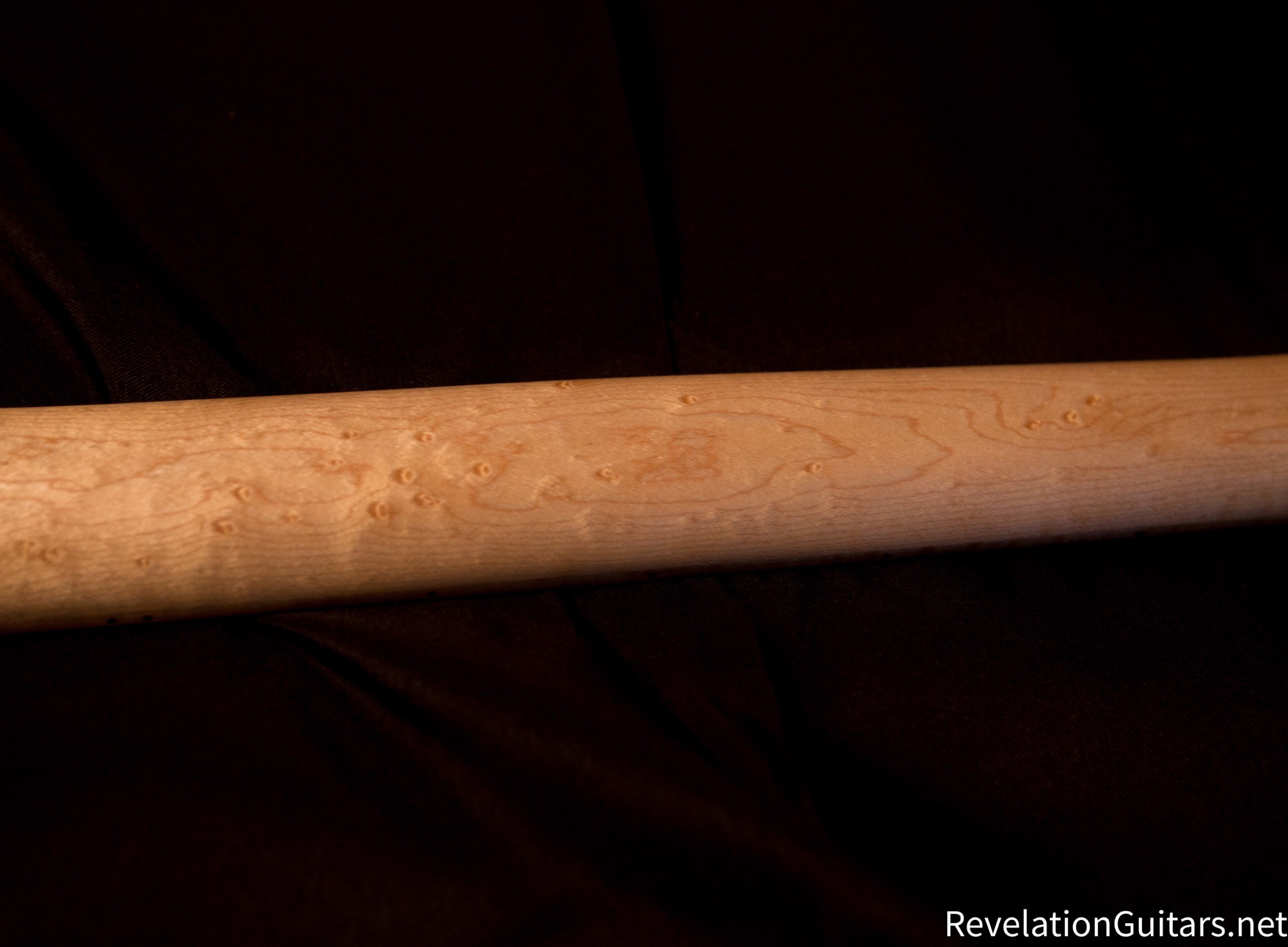 Birds-eye Maple neck Flame Maple fretboard