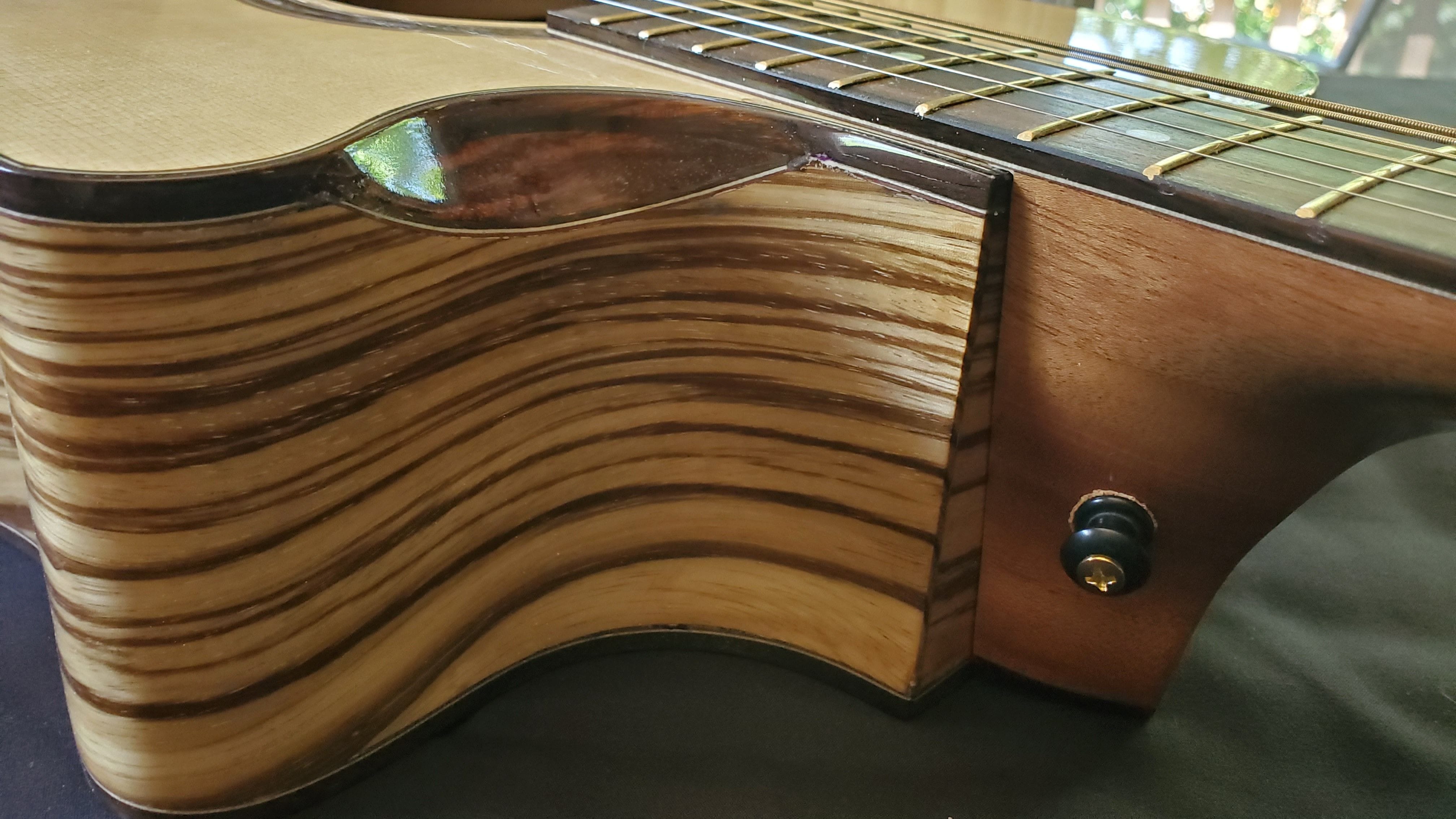 Solid Rosewood cutaway bevel