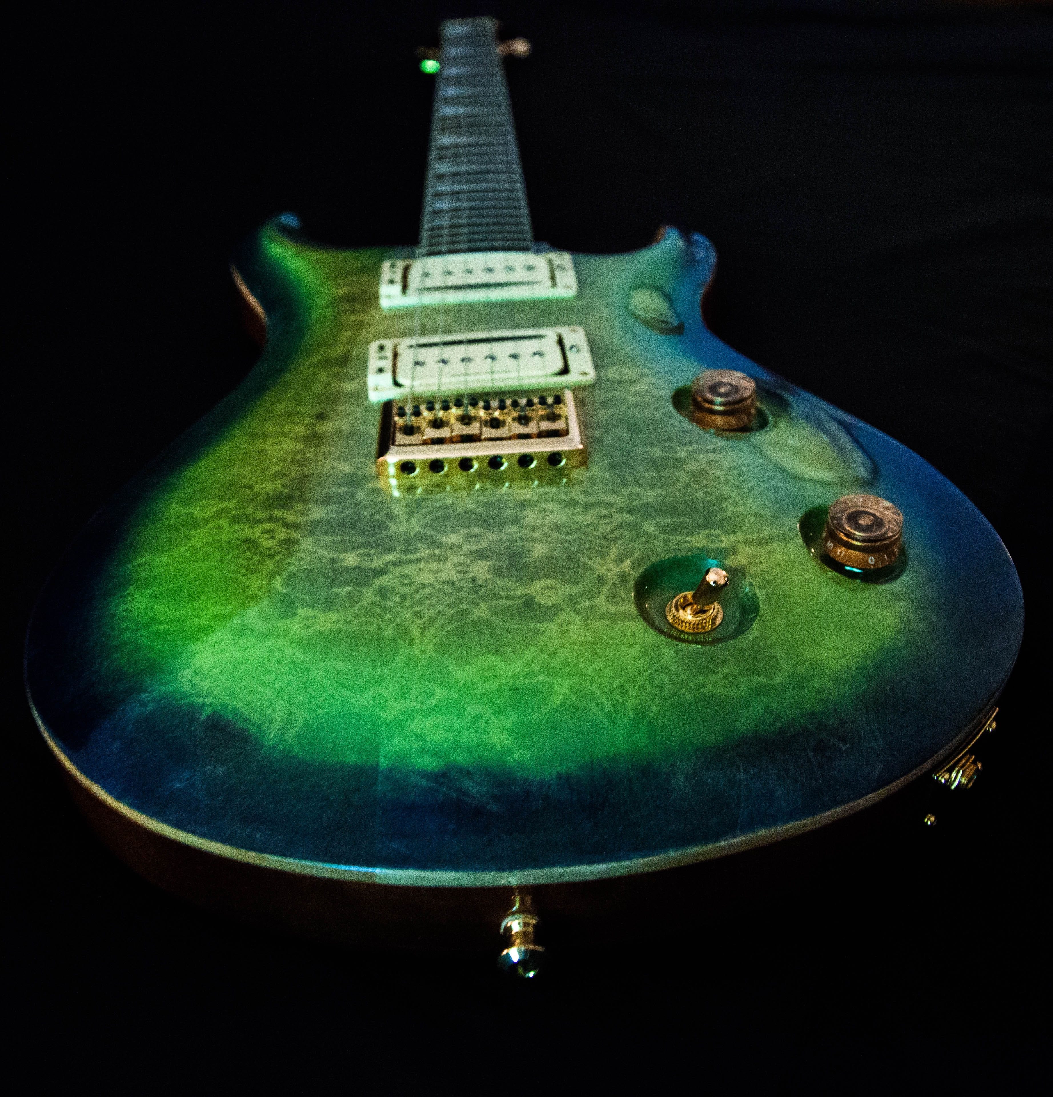 Revelation EG4. Map;e/Mahogany. DragonSkin